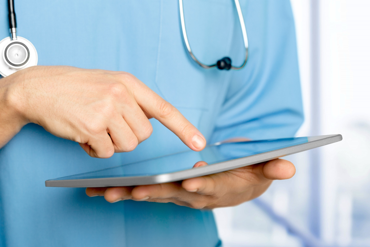 Doctor using tablet