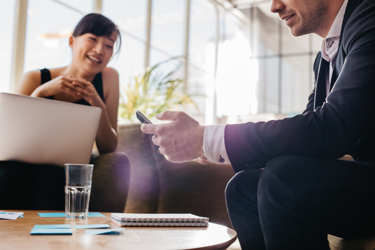 Man and woman having a meeting and smiling