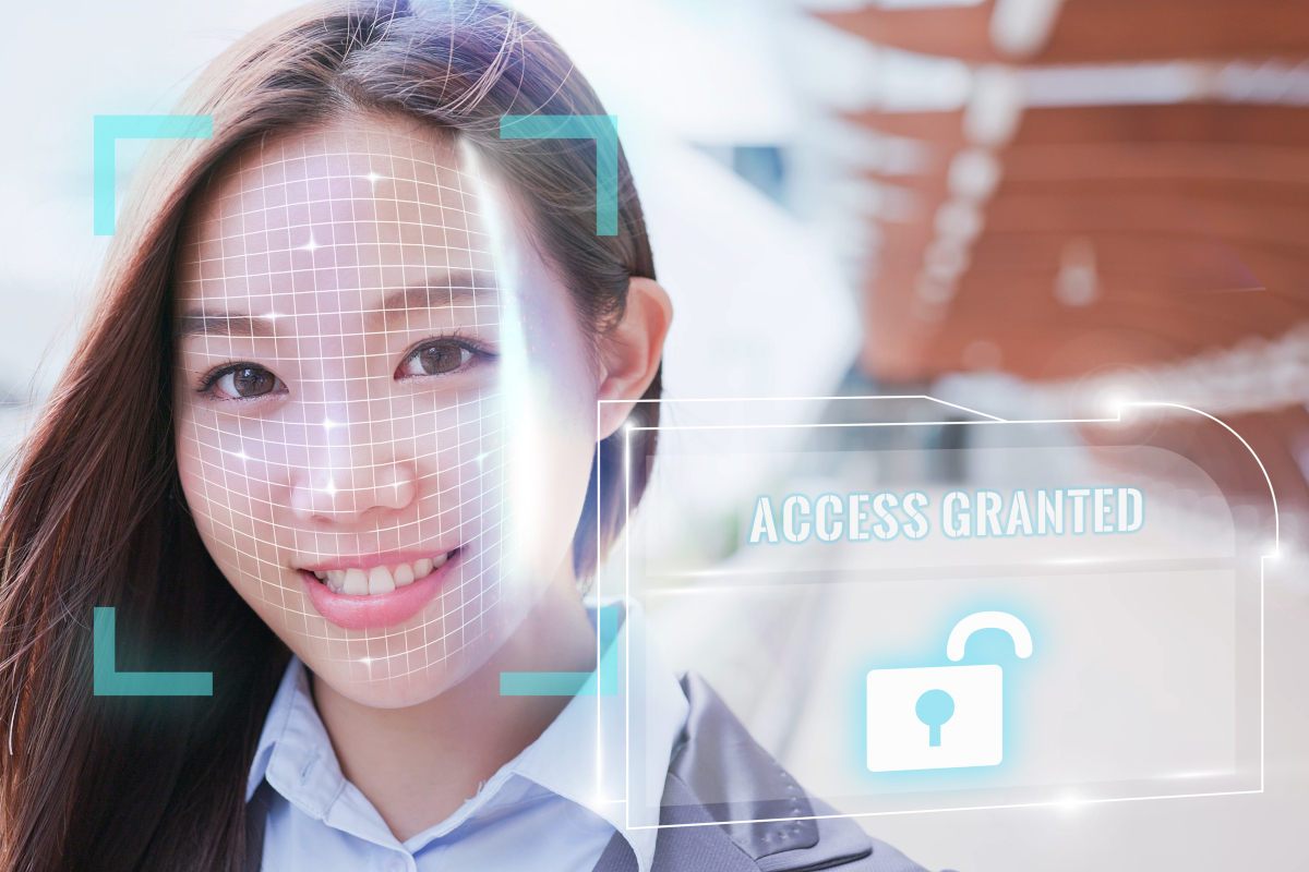 Woman whose face is being scanned with authentication process